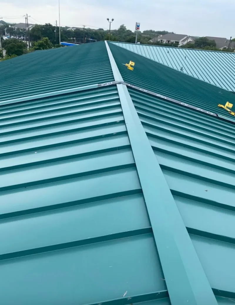 Green commercial metal roof ridge and valley for Metal Roof Repair in Irondale